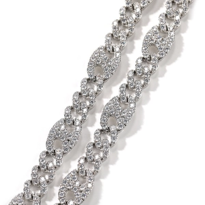 Detailed macro view of silver hip hop Cuban chain with pave-set white cubic zirconia links
