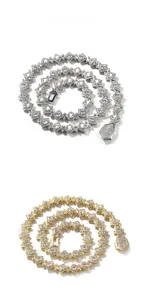 Detailed tile display of iced out hip-hop chains in gold and silver finish with pave zircons