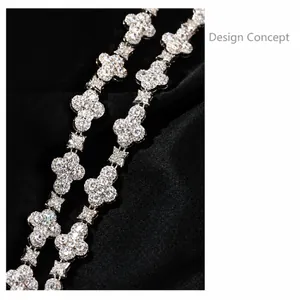 Close-up of 10mm hip hop cross-flower necklace with silver pavé cubic zirconia