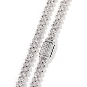 Macro view of 925 silver 6mm Cuban link chain with icy pave moissanite setting
