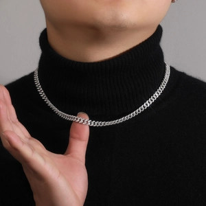 Men's 6mm 925 silver Cuban link chain necklace with sparkling moissanite on black sweater