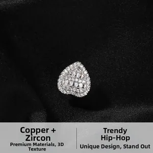 Macro shot of silver hip hop heart grillz with iced out square zircon in micro pave setting