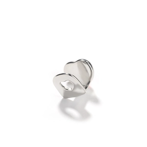 Minimalist silver heart ear cuff with polished finish and hollow heart design on white background