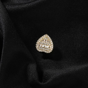 Luxurious gold heart pendant with sparkling cubic zirconia on elegant black silk fabric