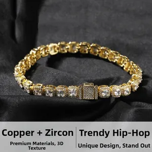 Detailed macro view of 7mm gold hip-hop chain with cubic zirconia and square box clasp