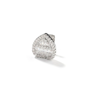 Macro detail of silver heart shaped grillz with sparkling white cubic zirconia baguette