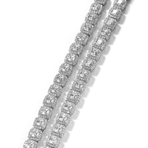 Detail of 7mm square-cut zircon tennis chain with halo setting in silver finish
