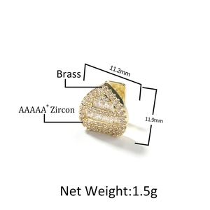 Golden heart-shaped zircon tooth grillz made of brass with AAAAA+ baguette stones