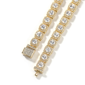 Detail of 7mm golden hip hop tennis chain with square zircons and iced out box clasp