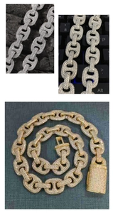 Macro detail of iced-out mariner link chain with square pave zircon clasps in gold and silver