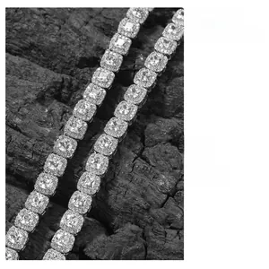 Macro shot of 7mm square-cut cubic zirconia hip hop chain with halo diamond setting
