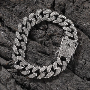 Detail of 12mm silver iced out Cuban link bracelet with sparkling rhinestones and square clasp