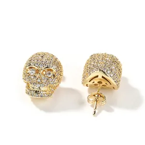 Boucles d'oreilles tête de mort hip hop pour hommes dorées avec micro-pavage de zircons