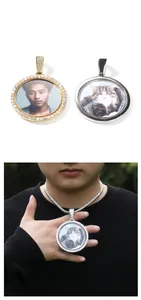 Detail showing gold iced out and silver personalized rotating picture frame pendant necklaces