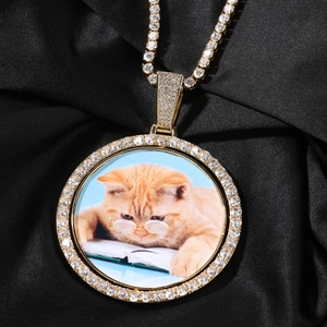 Custom spinning round photo pendant with iced out rhinestones on a gold hip-hop chain