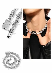 Close-up of hip-hop barbed wire necklace with silver plating and iced-out zircons