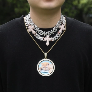 Hip hop multi-layered chain necklace featuring a rotating photo locket and diamond cross