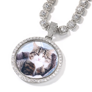 Detail of custom silver photo pendant with iced out tennis chain and cz stones