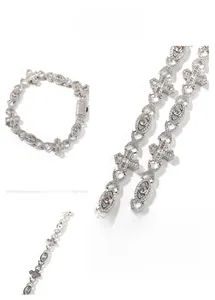 Detailed macro view of hip hop silver bracelet with zircon crosses and evil eye links