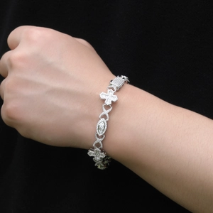 Men's hip hop iced out cross and eye link bracelet with sparkling silver finish