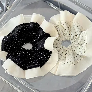 Set of black and white polka dot ruffled scrunchies with elegant chiffon pleats