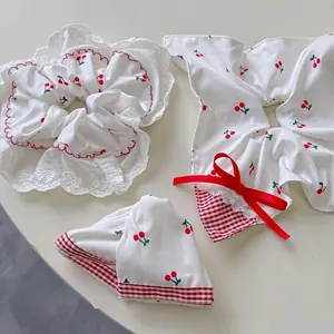 Three-piece hair accessory set with cherry print, lace edges, and red bows for women