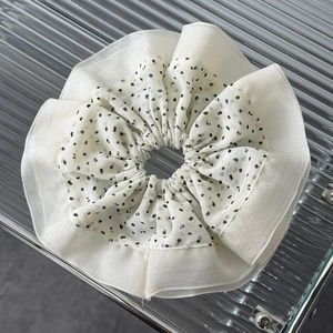 Elegant white layered scrunchie with black polka dots and ruffle organza detail