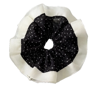 Black and white polka dot oversized scrunchie with layered ruffle trim hair tie