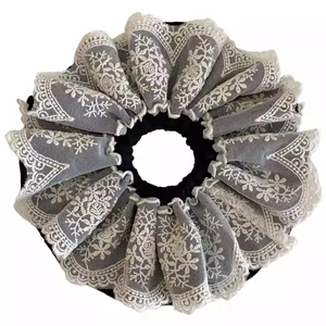 Vintage French style lace scrunchie with layered floral embroidery for elegant hair styling
