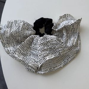 Elegant polka dot bow scrunchie for women with black and white chiffon texture hair tie