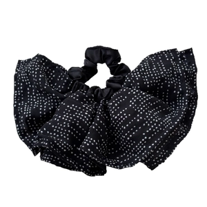 Chic black and white polka dot oversized scrunchie with ruffled chiffon texture