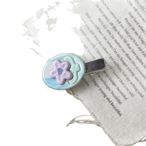 Sweet floral acetate duckbill hair clip with blue marbled oval resin and purple flower