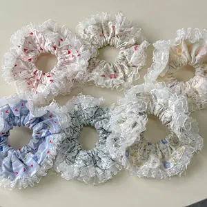Floral and heart pattern hair scrunchies set with lace edges for elegant ponytails