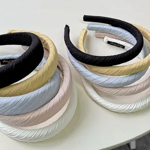Minimalist pleated fabric sponge headband in various colors with elegant twill texture