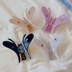 Lot de pinces à cheveux papillon avec strass colorés et finition pailletée en quatre couleurs