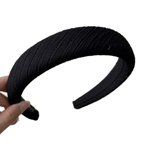 Minimalist black pleated wide headband with sponge height and wave textured fabric