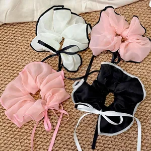 Set of 4 mesh scrunchies with bow ribbons in white pink and black for hairstyles