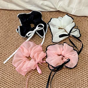 Set of 4 sweet organza scrunchies with long ribbon bows in white, black and pink