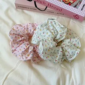 Floral print scrunchie set in pink and beige cotton fabric for sweet hair styling