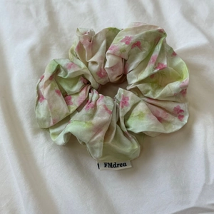 Floral print oversized scrunchie with pink oil painting flower pattern and brand label