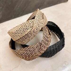 Cross-knit raffia headband set in gold, tan and black with metallic luster finish