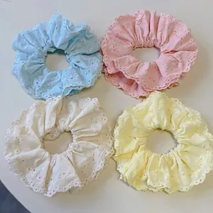 Set of 4 large pastel bow lace scrunchies in blue, pink, cream, and yellow cotton