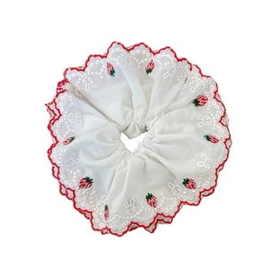 White embroidered scrunchie with cute strawberry and bunny patterns for hair styling