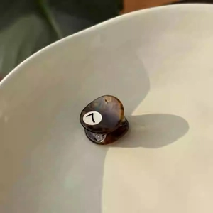 Mini tortoiseshell acetate hair claw clip with vintage brown marble pattern for women