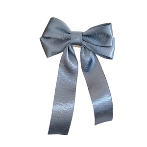 Elegant grey-blue satin bow hair clip with long ribbons and pearlescent finish