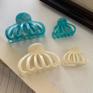 Vintage marble hair claw clips in blue and cream white acetate for elegant hairstyles
