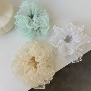 Three-piece set of mesh polka dot lace scrunchies in green, beige and white