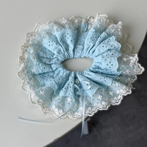 Sweet light blue lace scrunchie with white embroidery, ribbon bow, and pearl bead detail