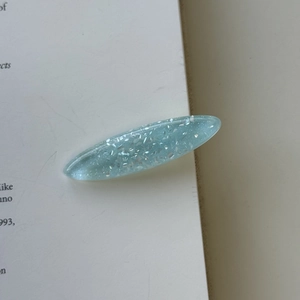 Light blue oval glitter resin hair clip with silver flakes for women and girls