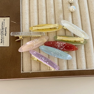 Set di 8 fermagli per capelli ovali in resina con glitter e clip dorate a becco